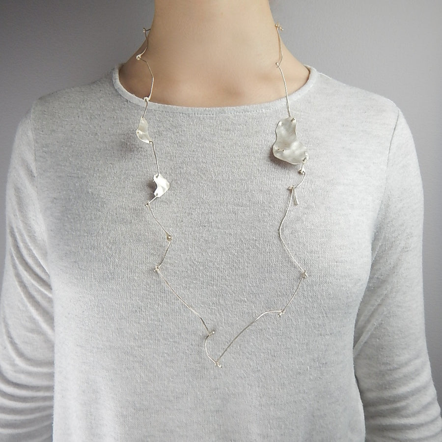 'Fancy Bones' Gold and brushed sterling silver necklace